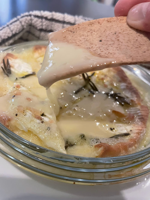 Serving Suggestion: Baked Camembert with crackers.