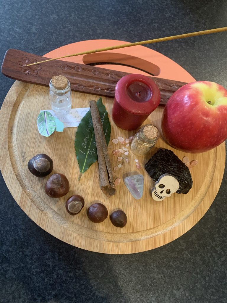 An Autumn themed altar ready for Samhain.