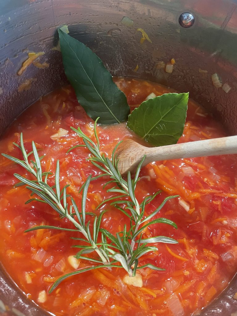Add Bay Leaves & Rosemary with intention to make a Magical Tomato Sauce for Pasta.