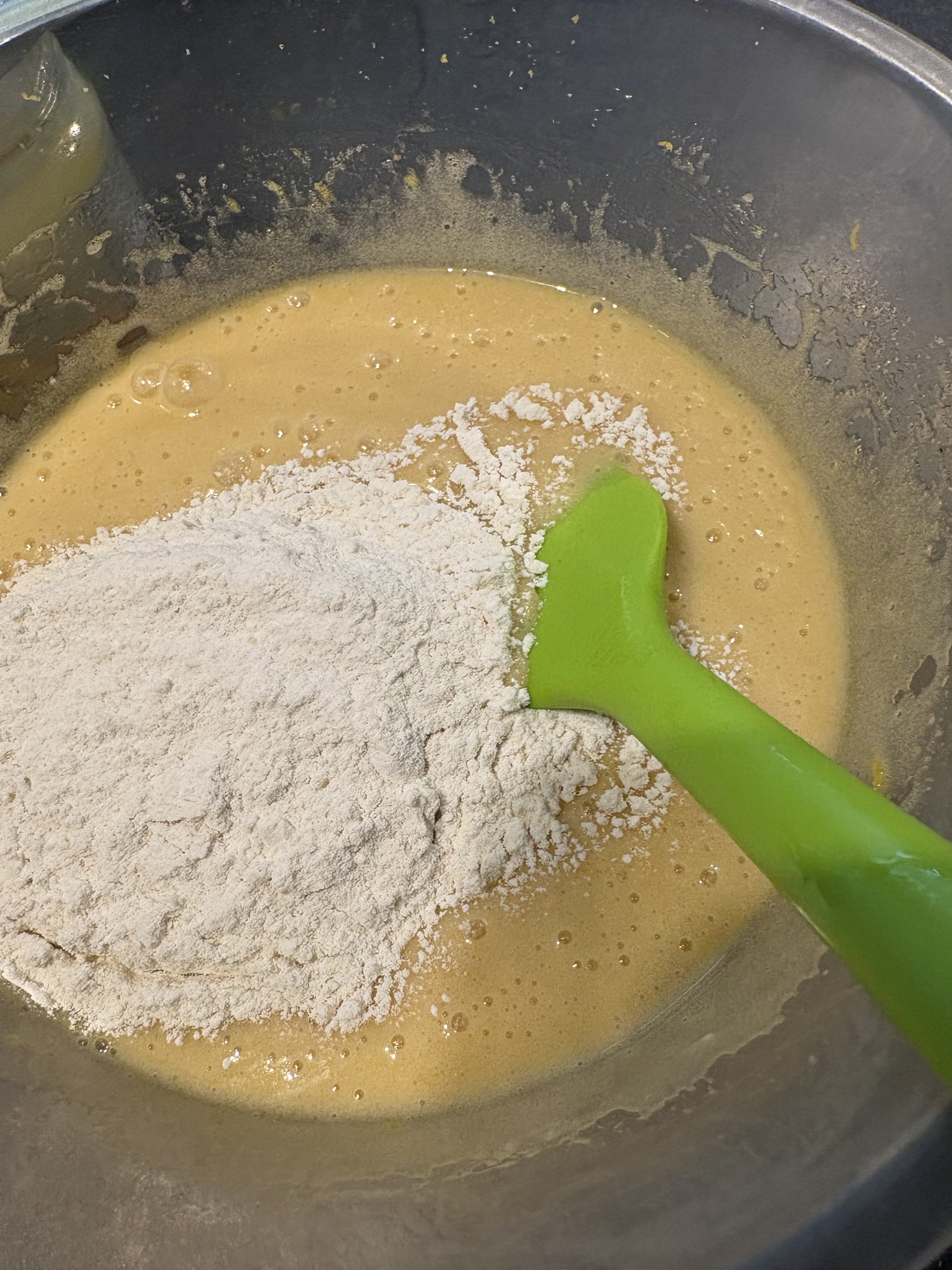 Making blondies - add flour